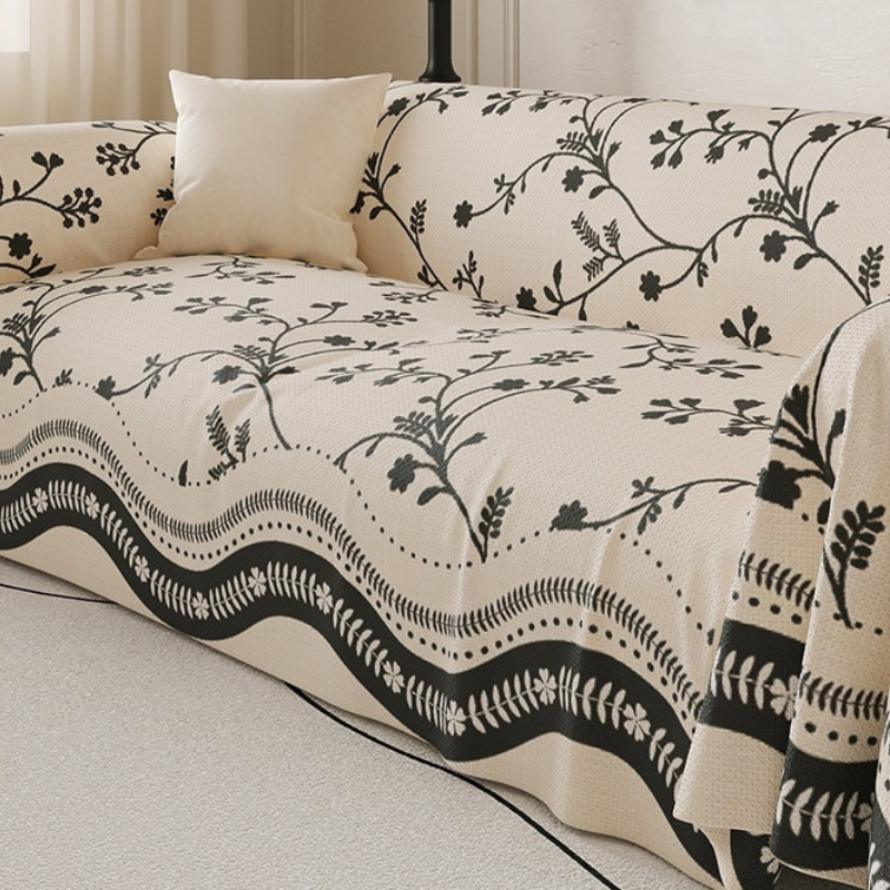 Jeté de canape motif nature chic de couleur noir