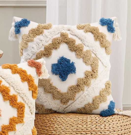 Housse de Coussin Bohème – Motifs Géométriques Colorés & Pompons Tressés